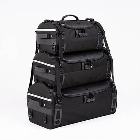 Stackable Tail bag comes in three sizes, stack up to three bags with two adjustable fasten straps with release buckle, large capacity storage, more personal stuff for a long trip travel.
